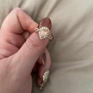Elegant Rose Gold Neil Lane engagement ring with diamond accent’s